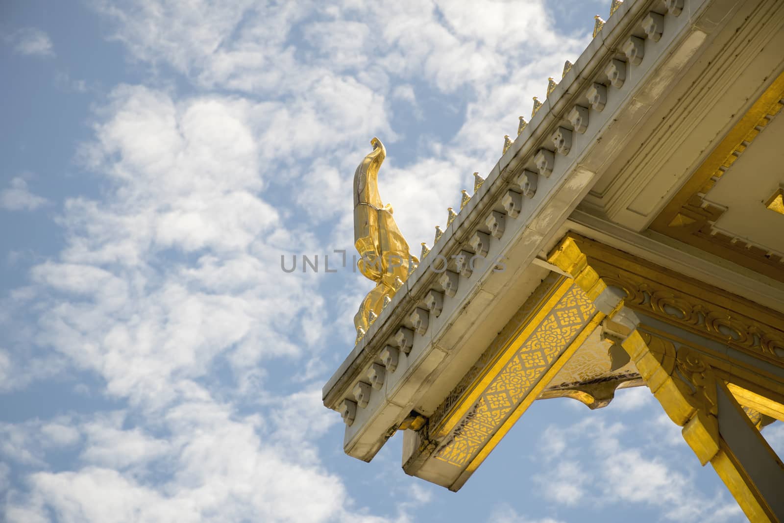 Serpent sculpture of temple roof in Thailand. ornament and detail in Thai art.