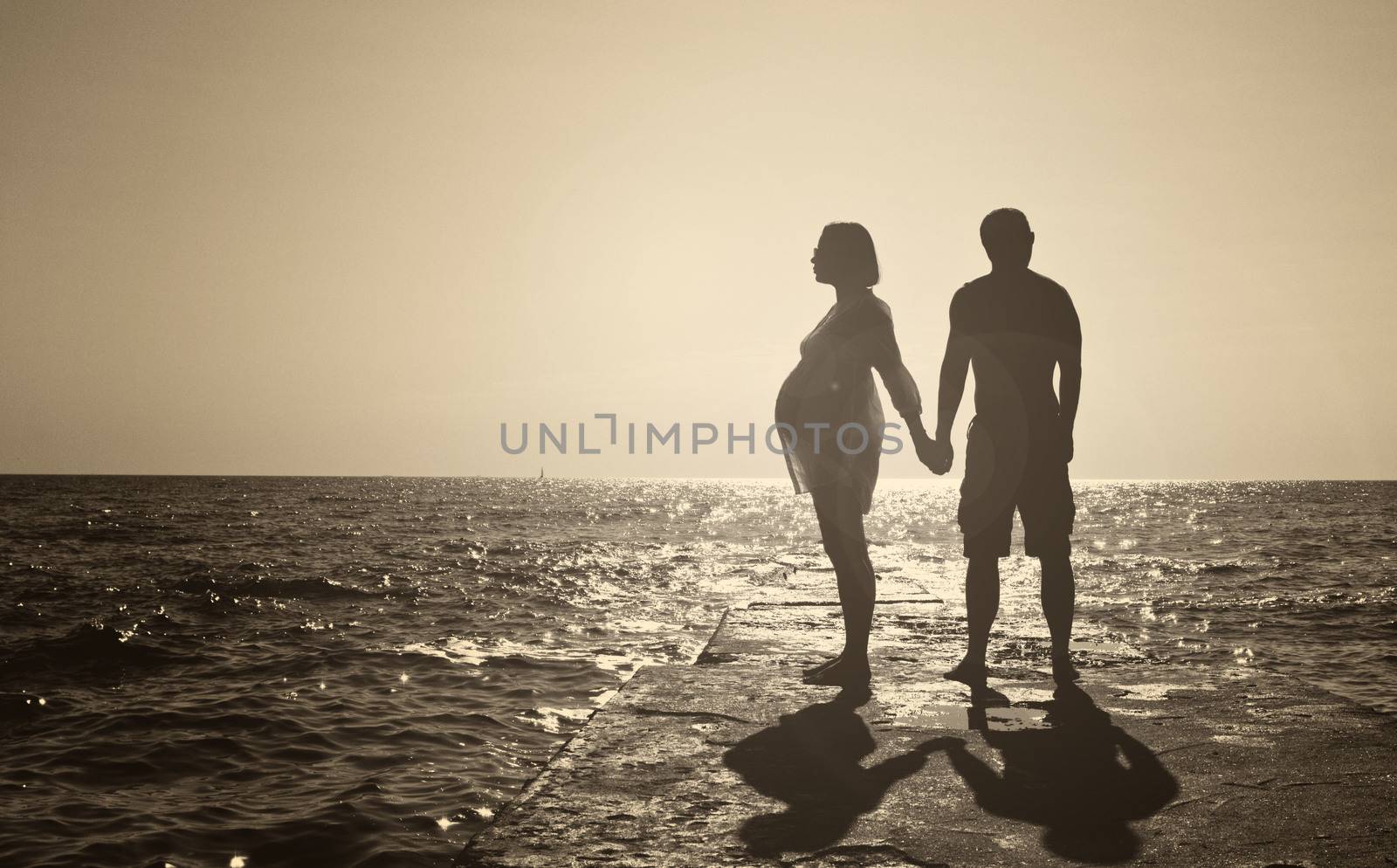 Romantic Couple on a Beach by Multipedia