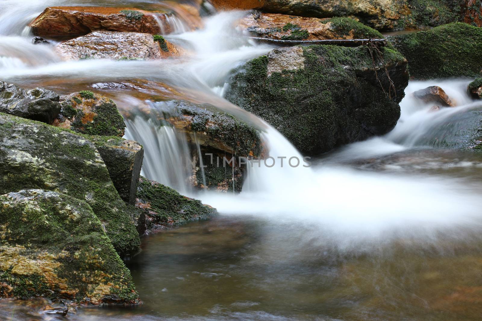 Water flowing over rocks - long exposure, Bila Opava, Czech republic