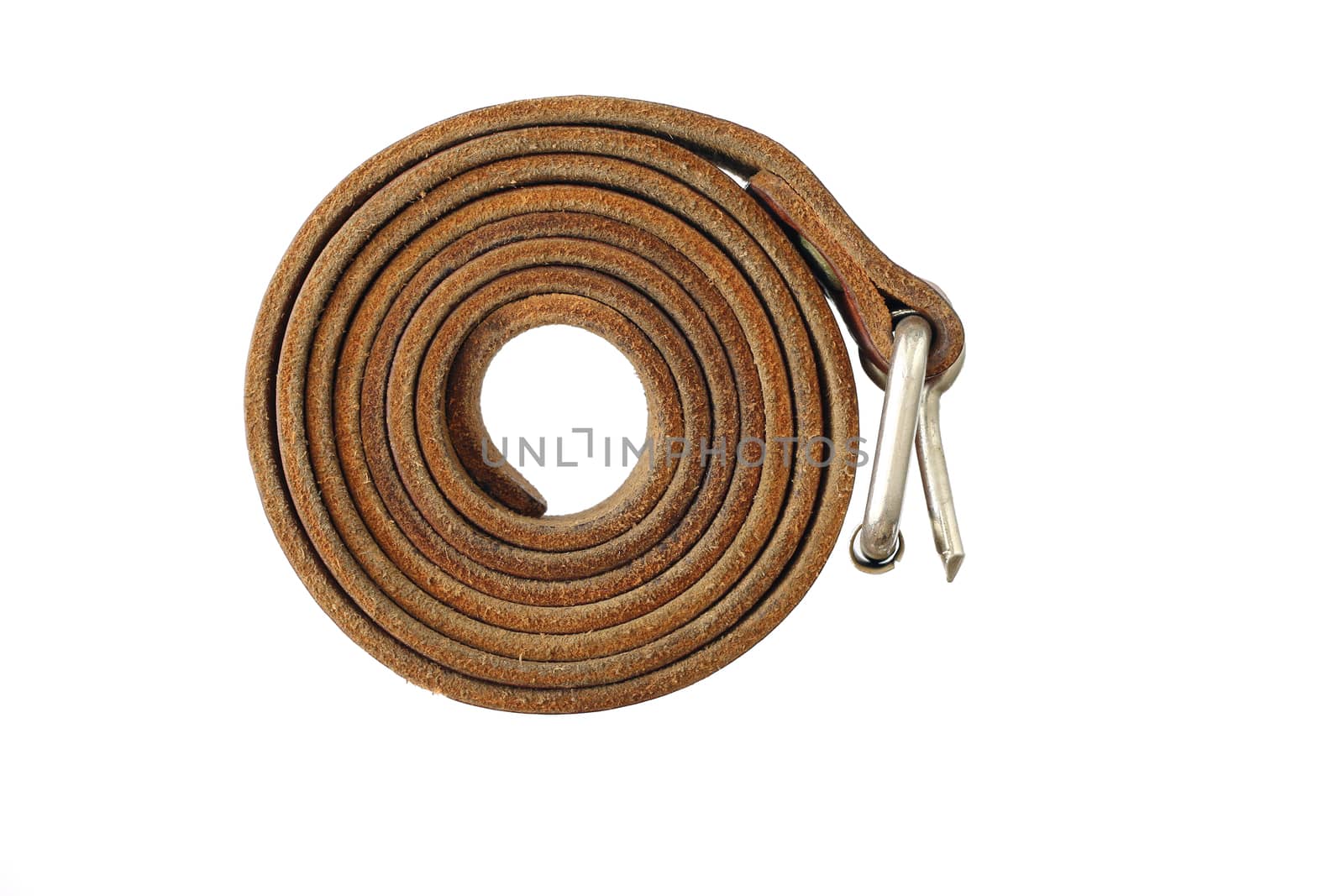 Coiled leather belt on a white background - tighten the belt