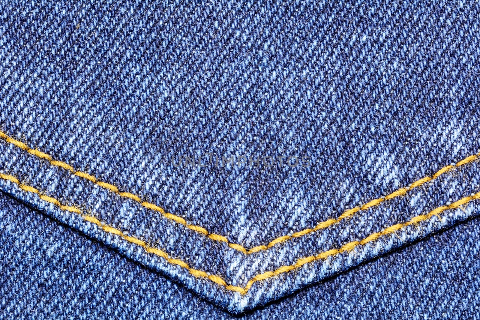 Denim jeans texture with pocket seams for fashion background