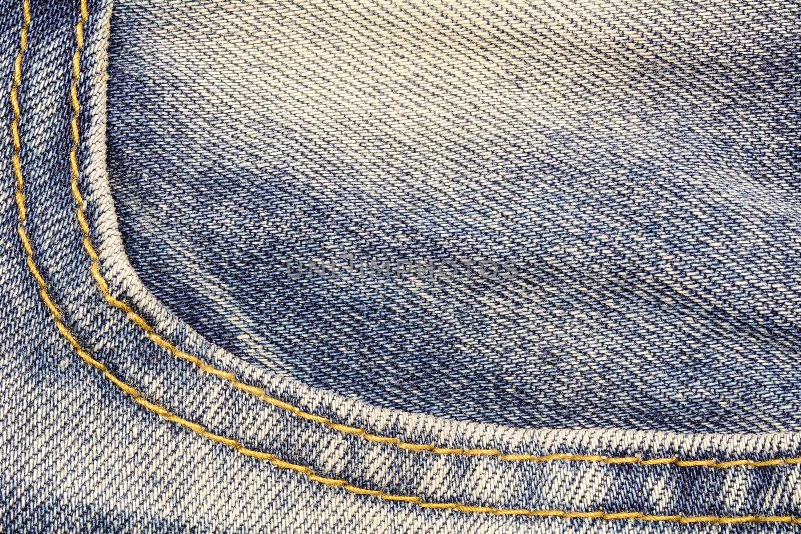 Denim jeans texture with curve seams for fashion background