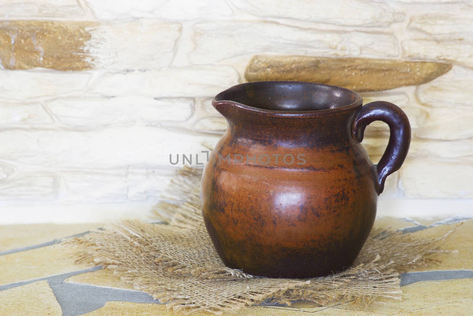 Clay jug, old ceramic vase 