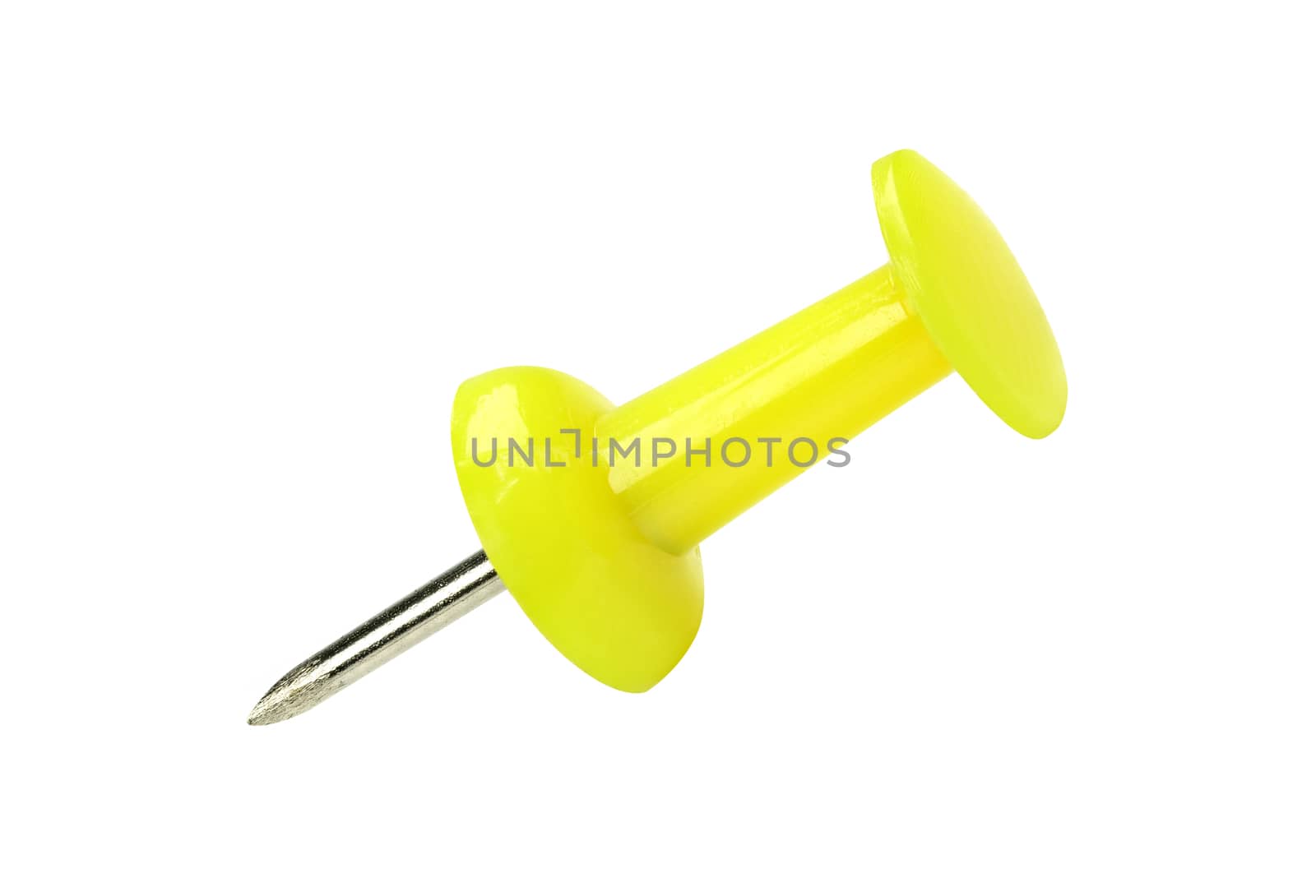 close up of a yellow pushpin isolated on white background