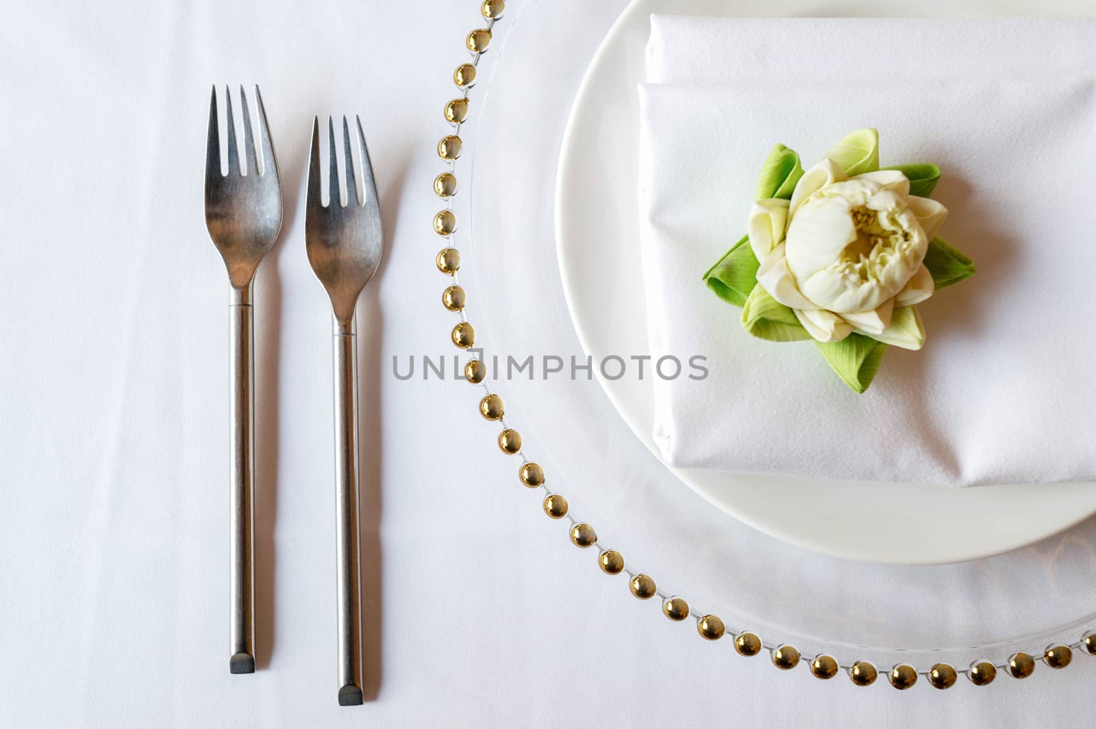 Elegance table set up with lotus, selective focus.