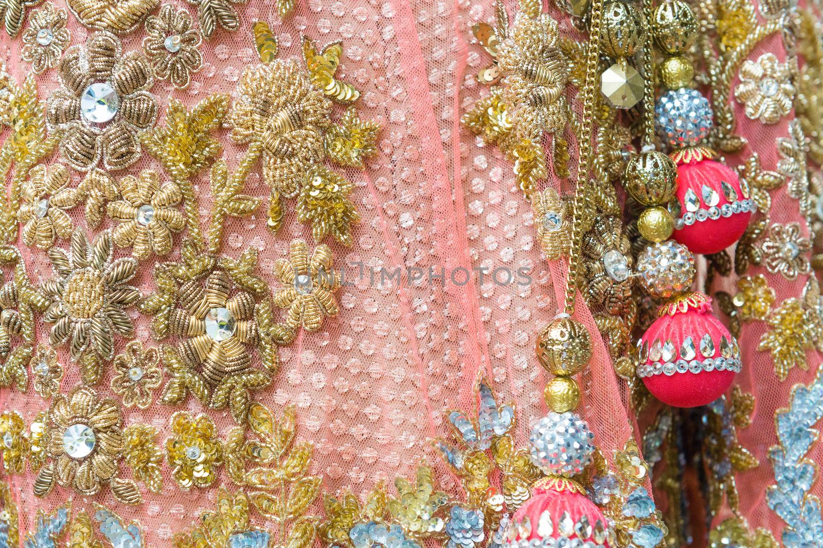 Indian embroidery on the dress, selective focus