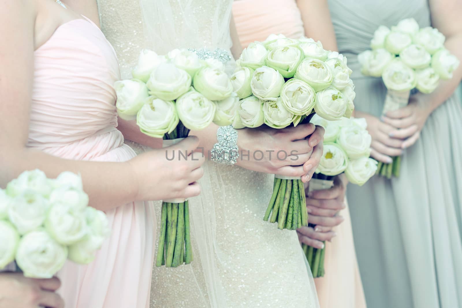 bouquets in females hand, selective focus.