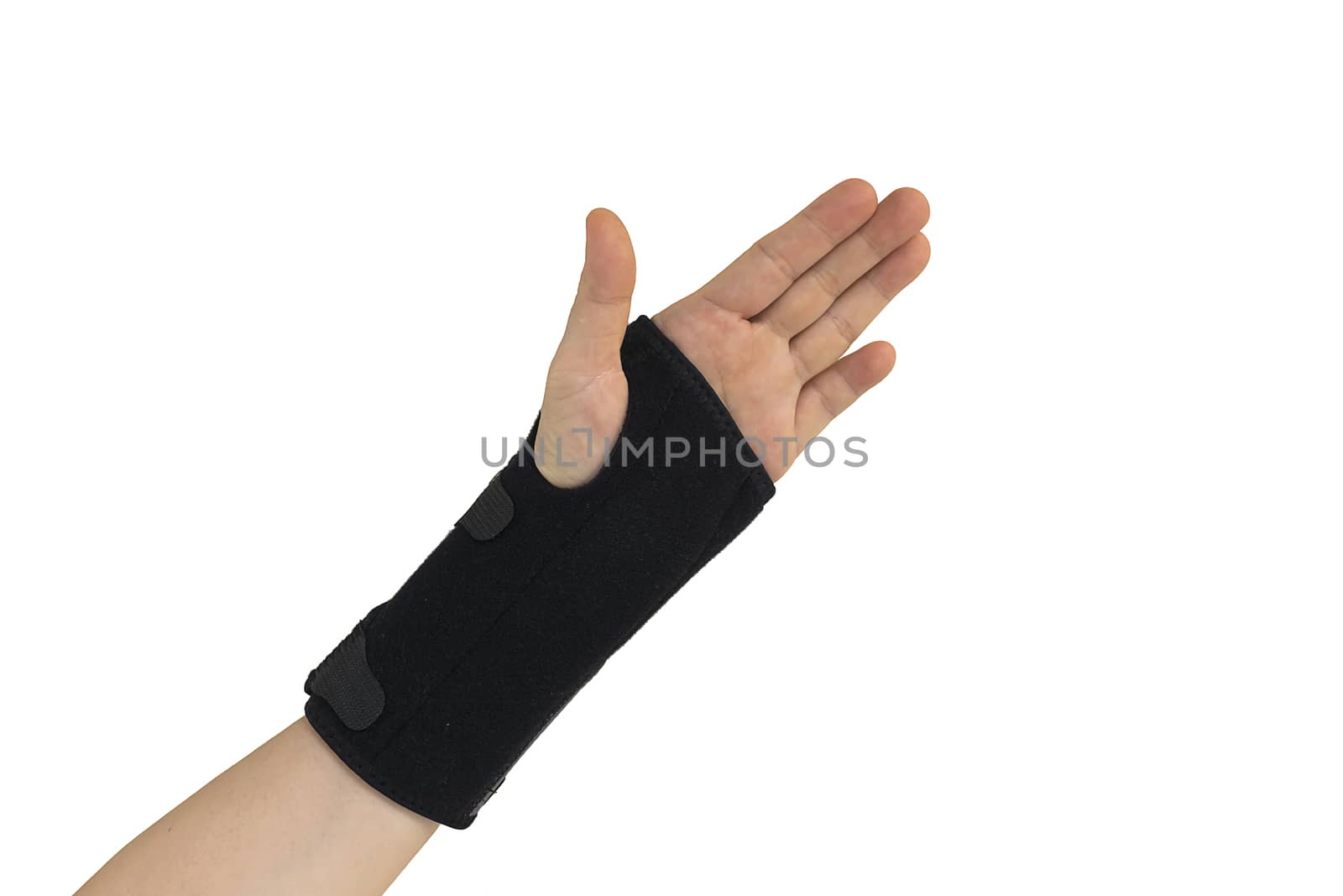 Woman pain hand in black wrist bandage with isolated.