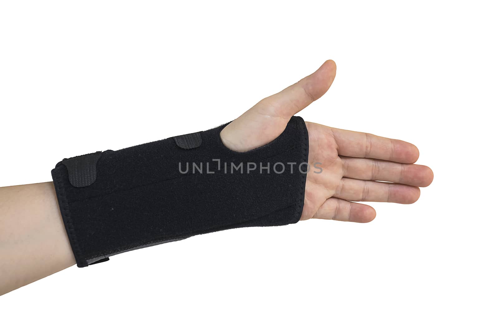 Woman pain hand in black wrist bandage with isolated.