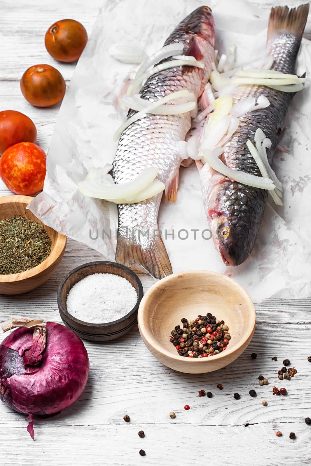 Freshly caught fish and spices cooking cooking