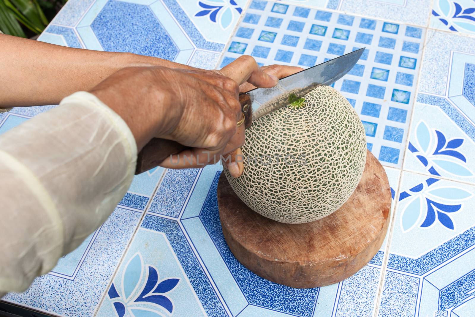 Melon on the table or Cantaloupe salad. Slices of melon on a tab by nopparats