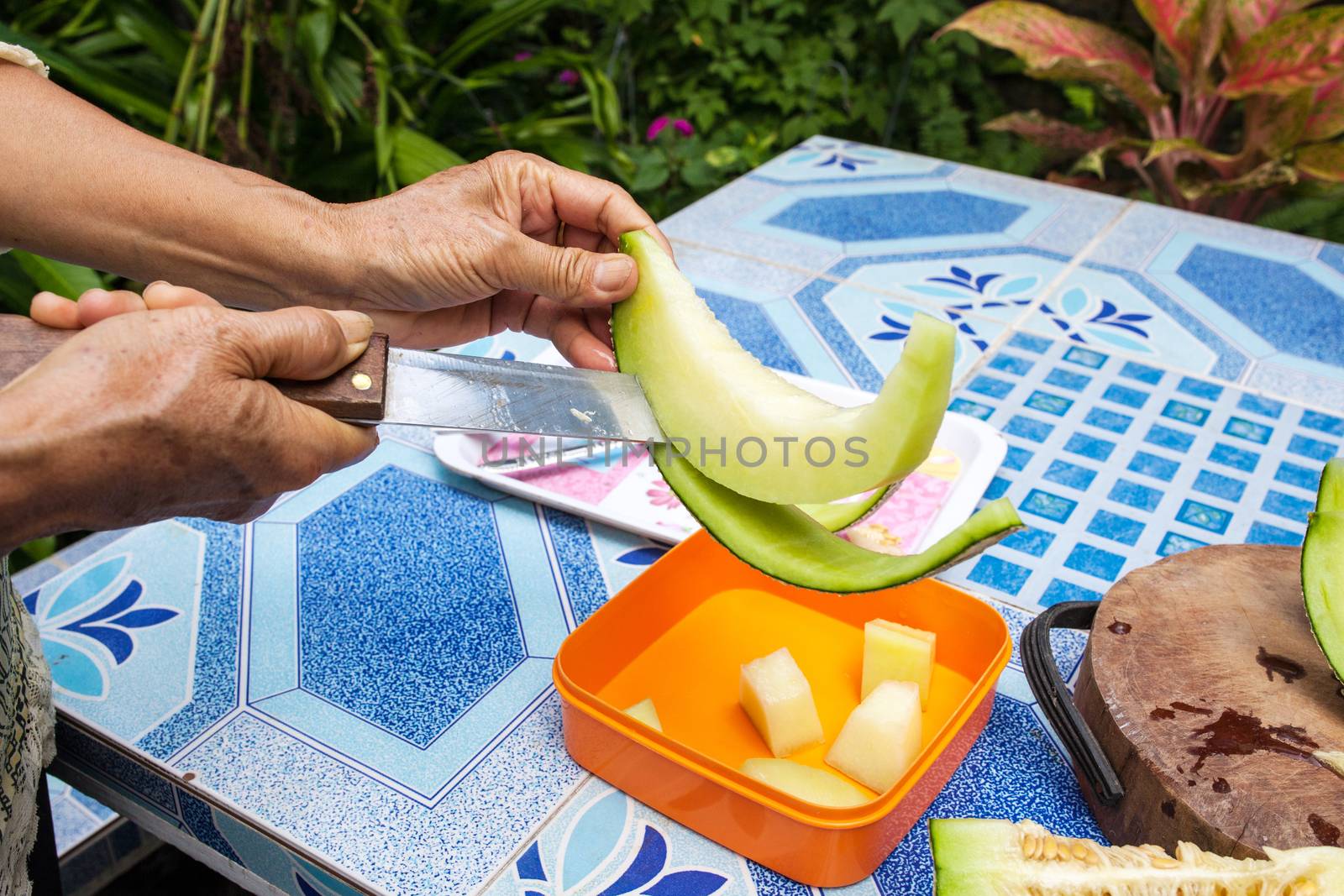 Melon on the table or Cantaloupe salad. Slices of melon on a tab by nopparats