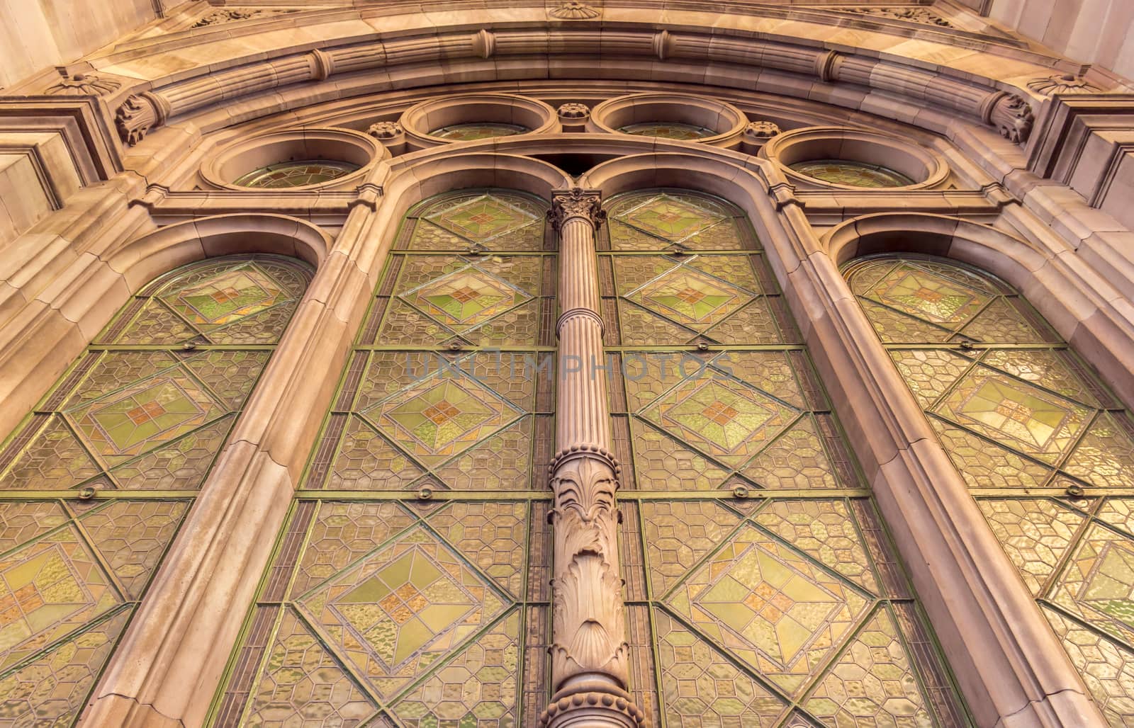 Strasbourg train station window, with huge stone columns and arch, very famous french architectural style known as art deco.