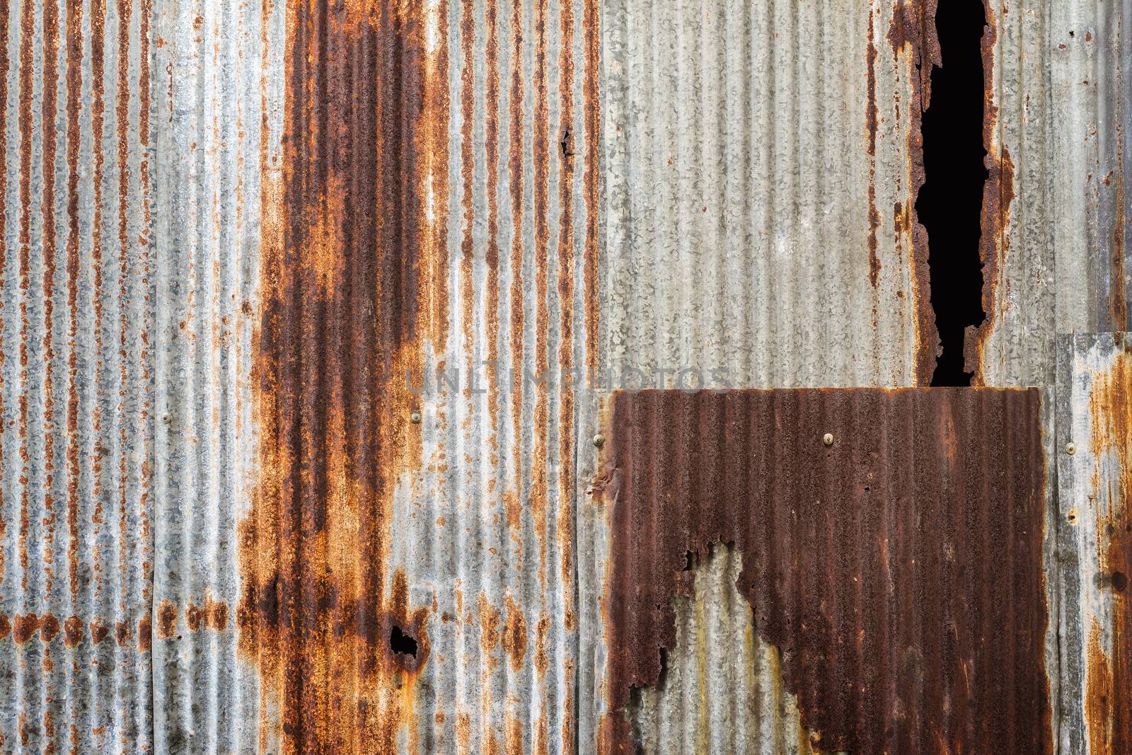 Old rusty zinc plat wall. by hkt83000