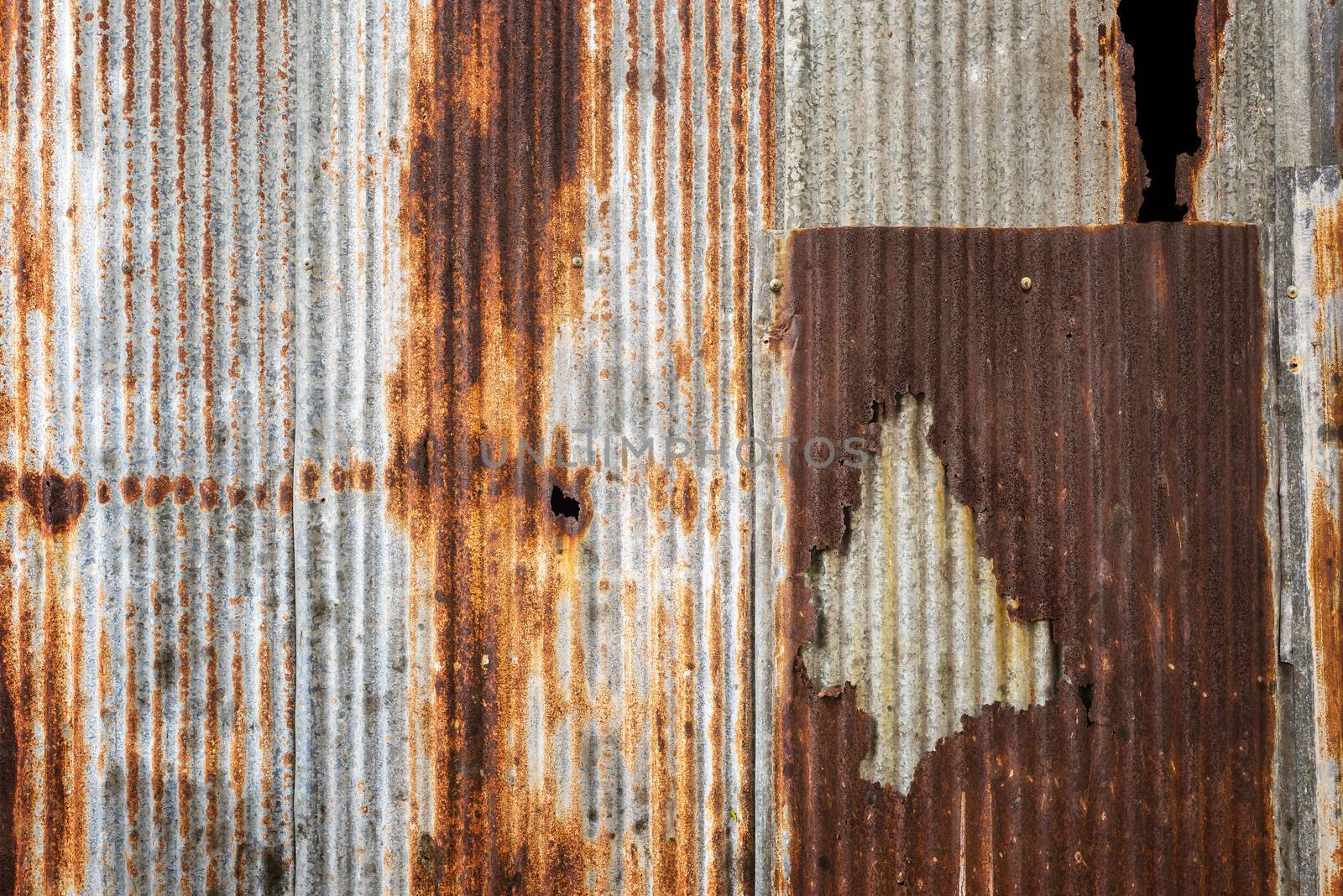 Old rusty zinc plat wall. by hkt83000