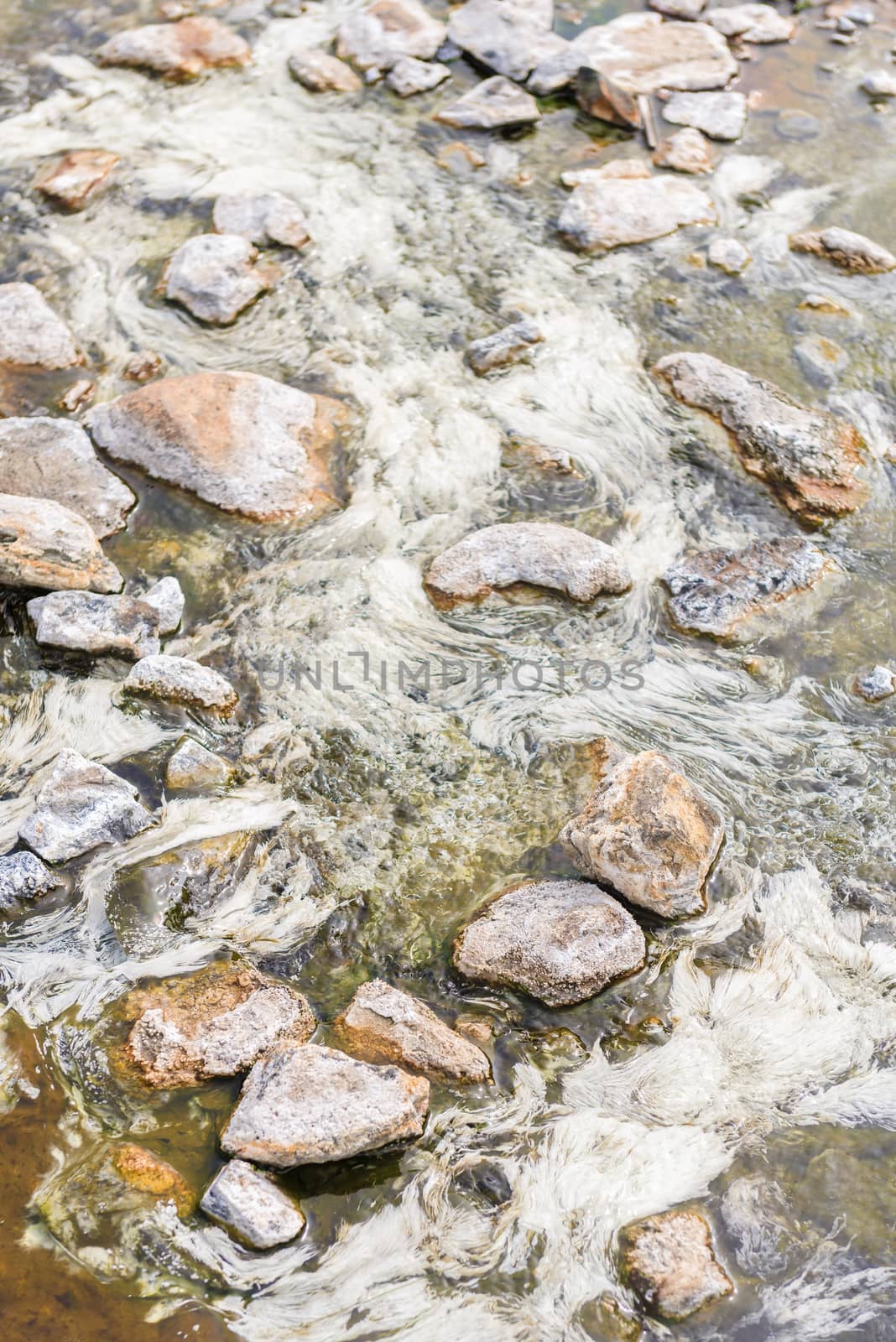 Streams of hotsprings. Selective focus.