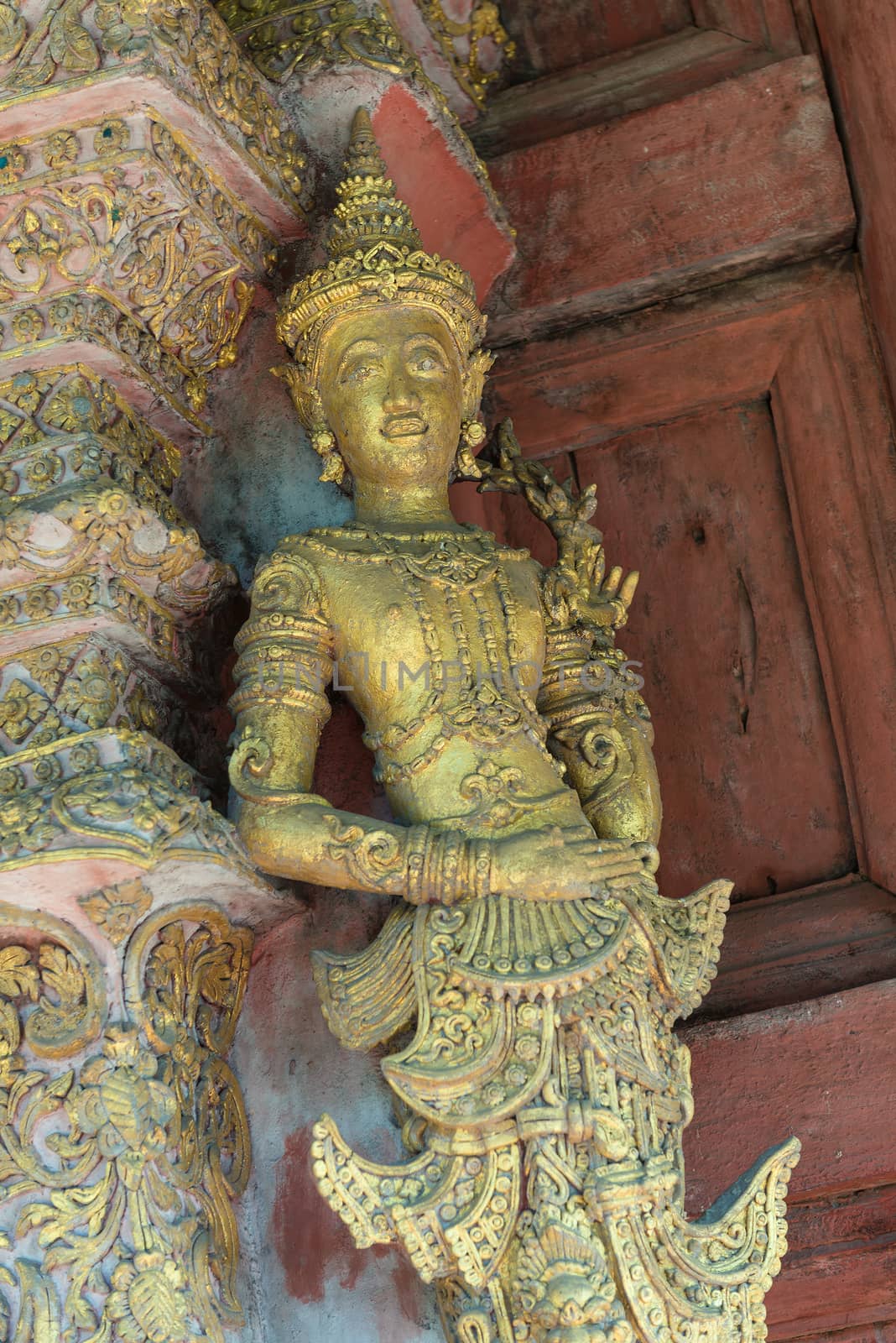 Thai pattern Handmade wood carvings at the front door of Thai temple.