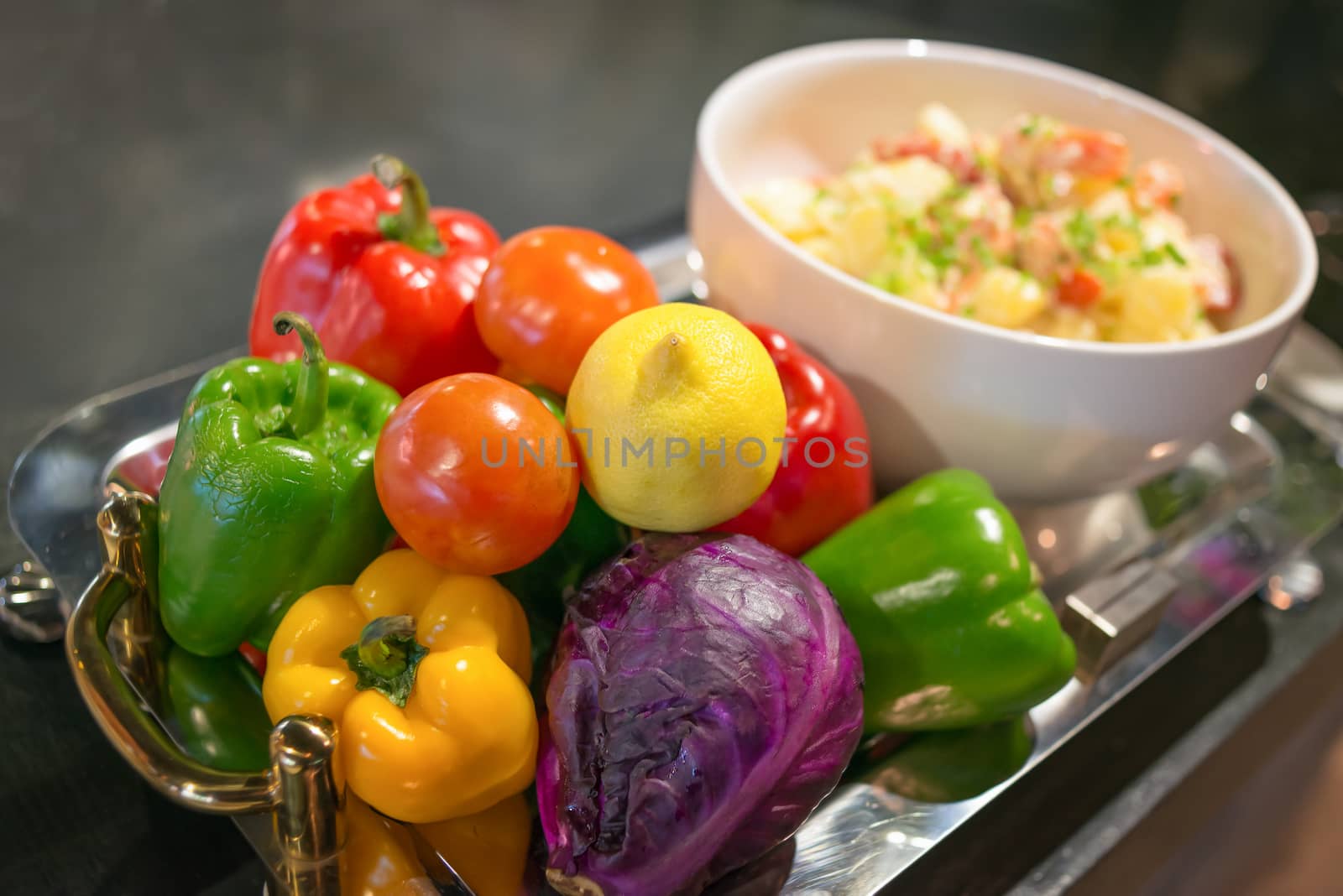 Vegetables and fruits in tray.