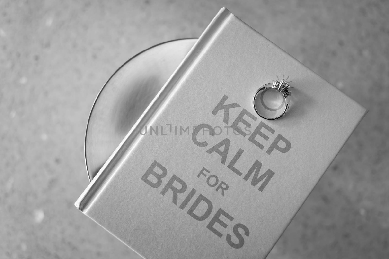 Bridal ring on book. by hkt83000