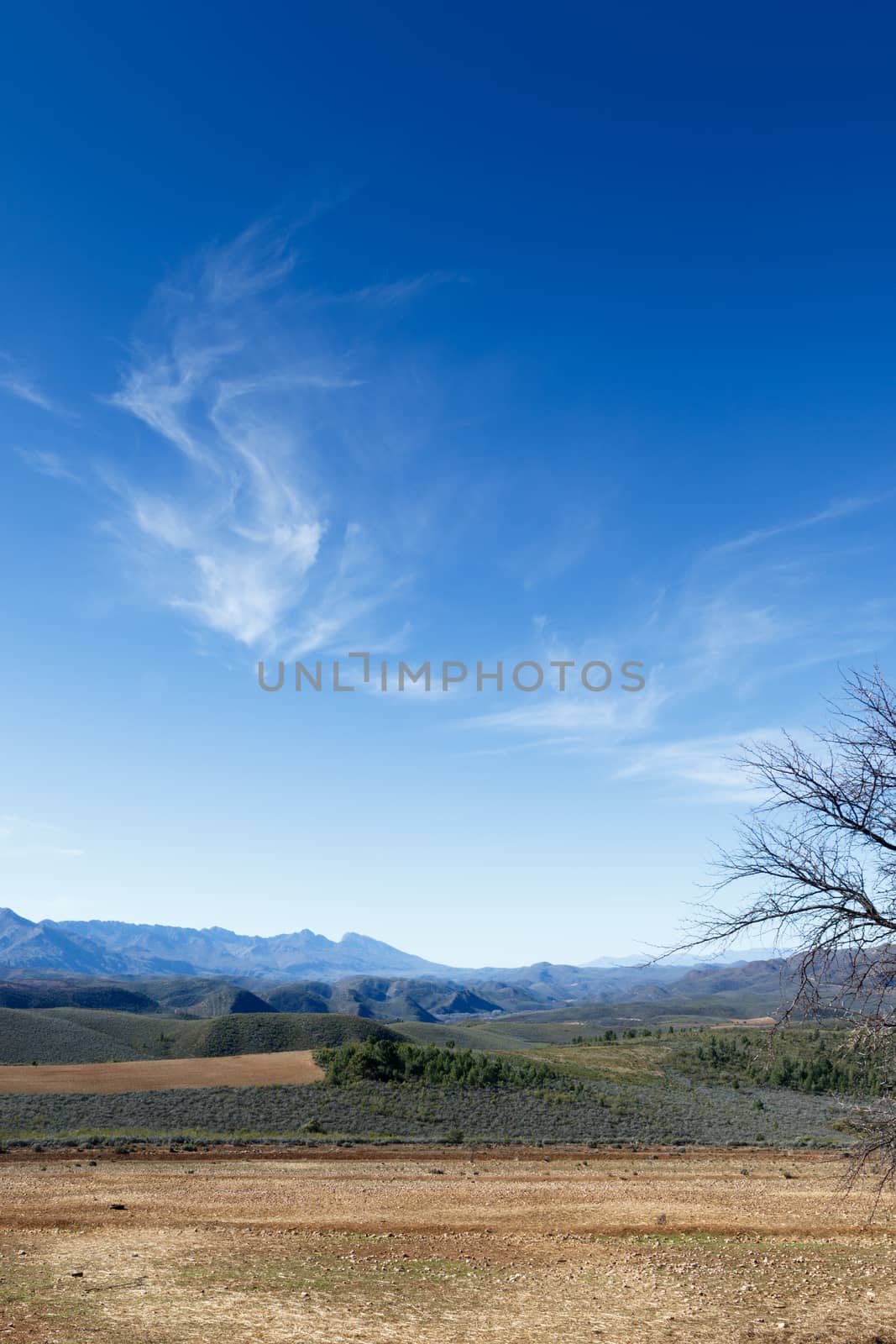 Clouds are talking - The Swartberg mountains are a mountain range in the Western Cape province of South Africa. It is composed of two main mountain chains running roughly east-west along the northern edge of the semi-arid Little Karoo.