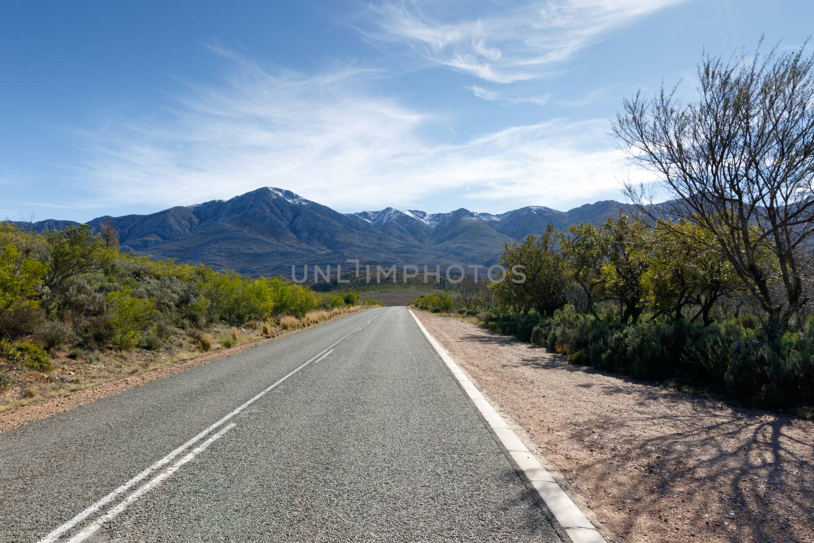 Snow - The Swartberg mountains are a mountain range in the Western Cape province of South Africa. It is composed of two main mountain chains running roughly east-west along the northern edge of the semi-arid Little Karoo.