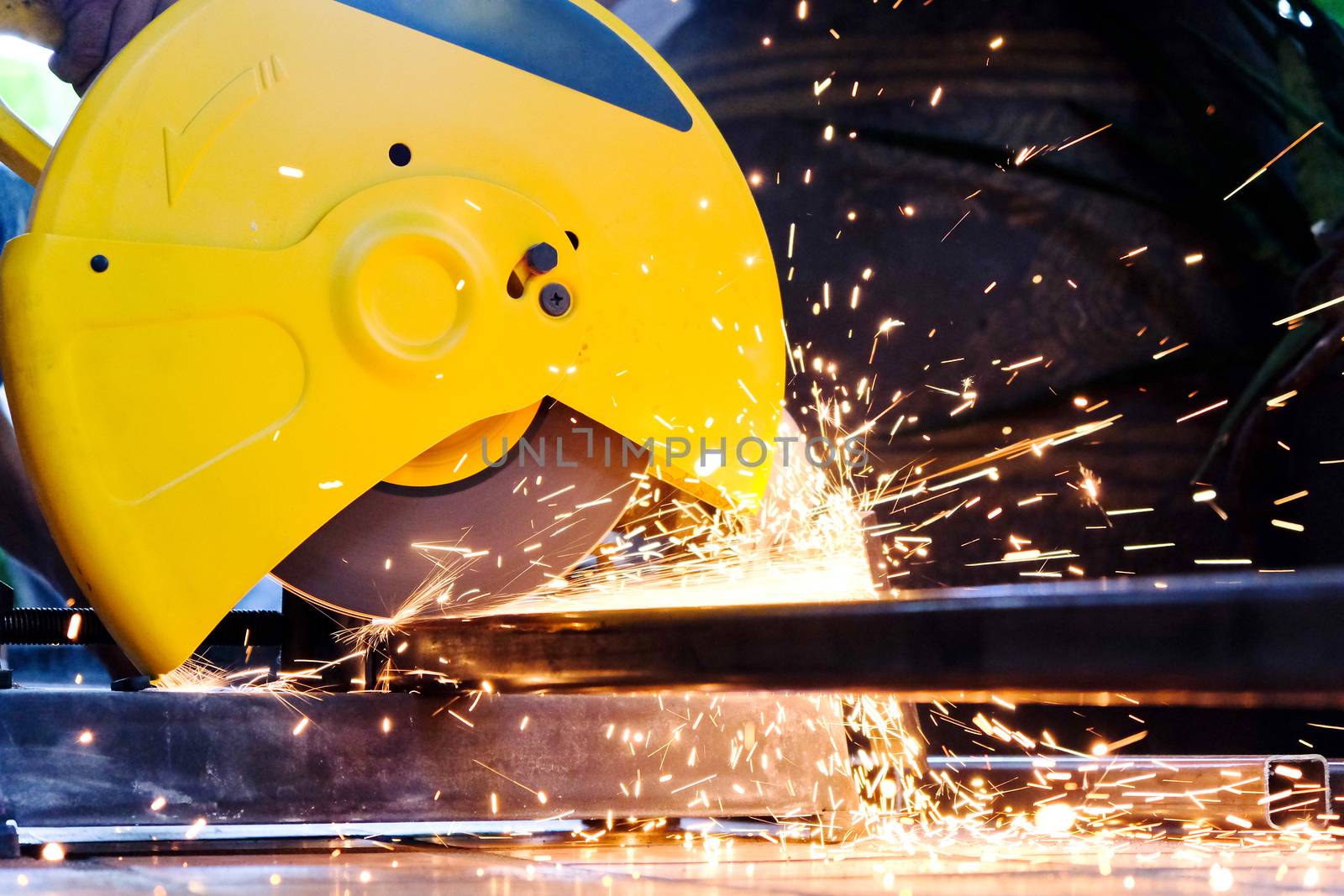 Metalworking / close up of cutting metal, Industrial Worker
