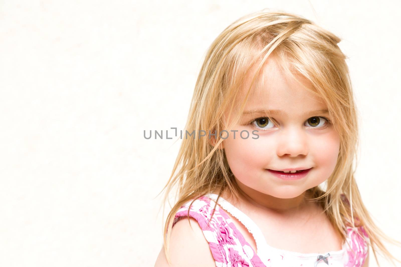 Portrait of Beautiful Smiling Toddler Girl with Blonde Hair by scheriton