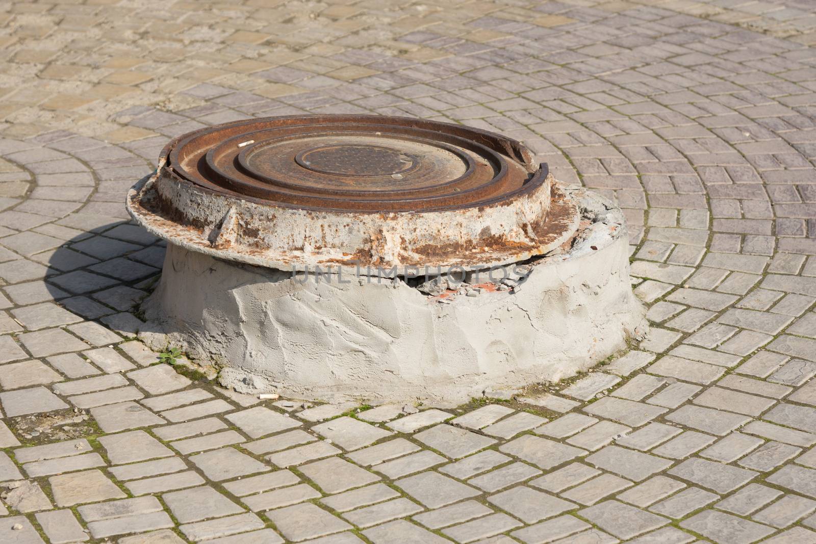 MOVE well cover on a concrete pedestal