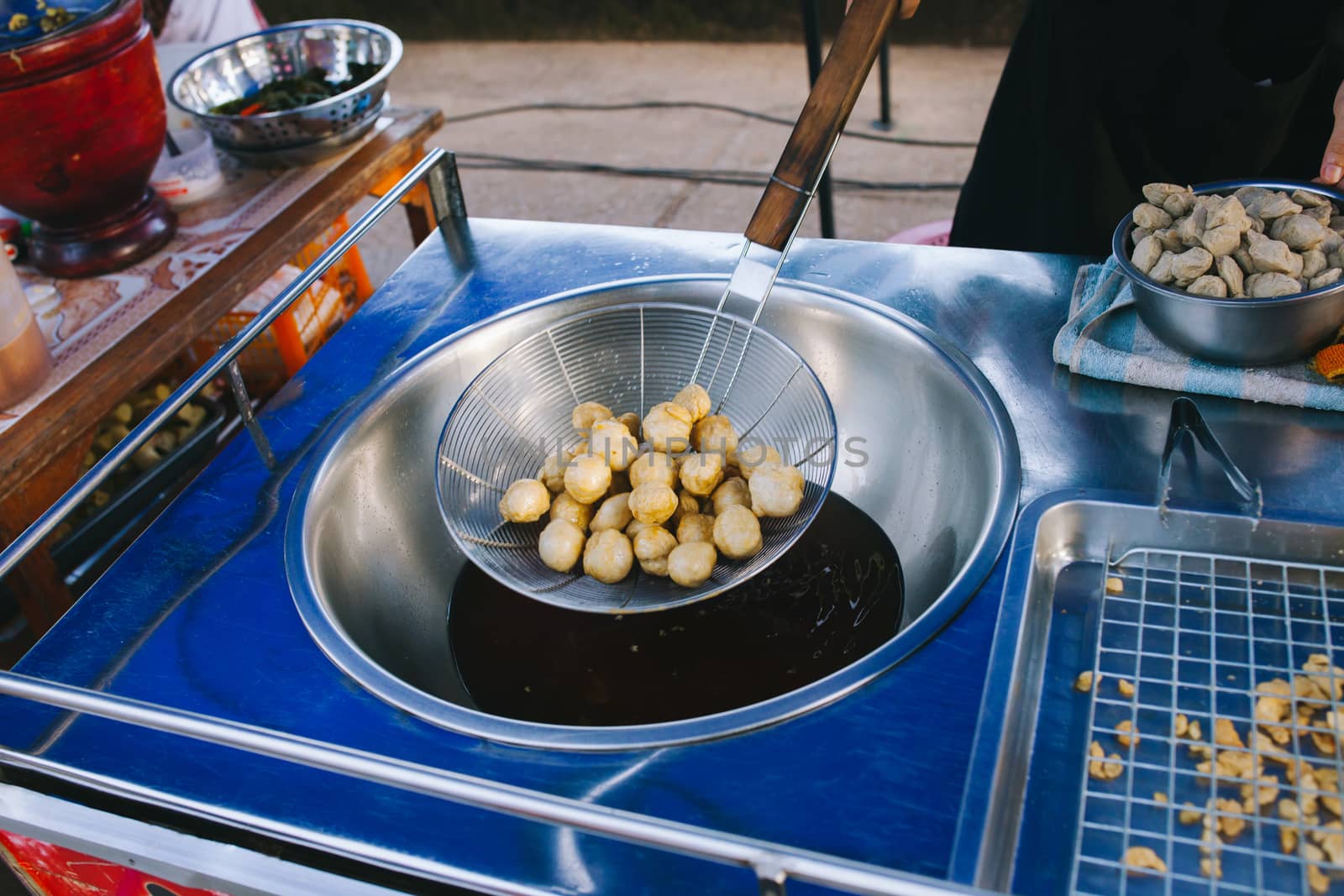 Cooking, Deep frying fishball in the pan in hot oil. street food in Thailand