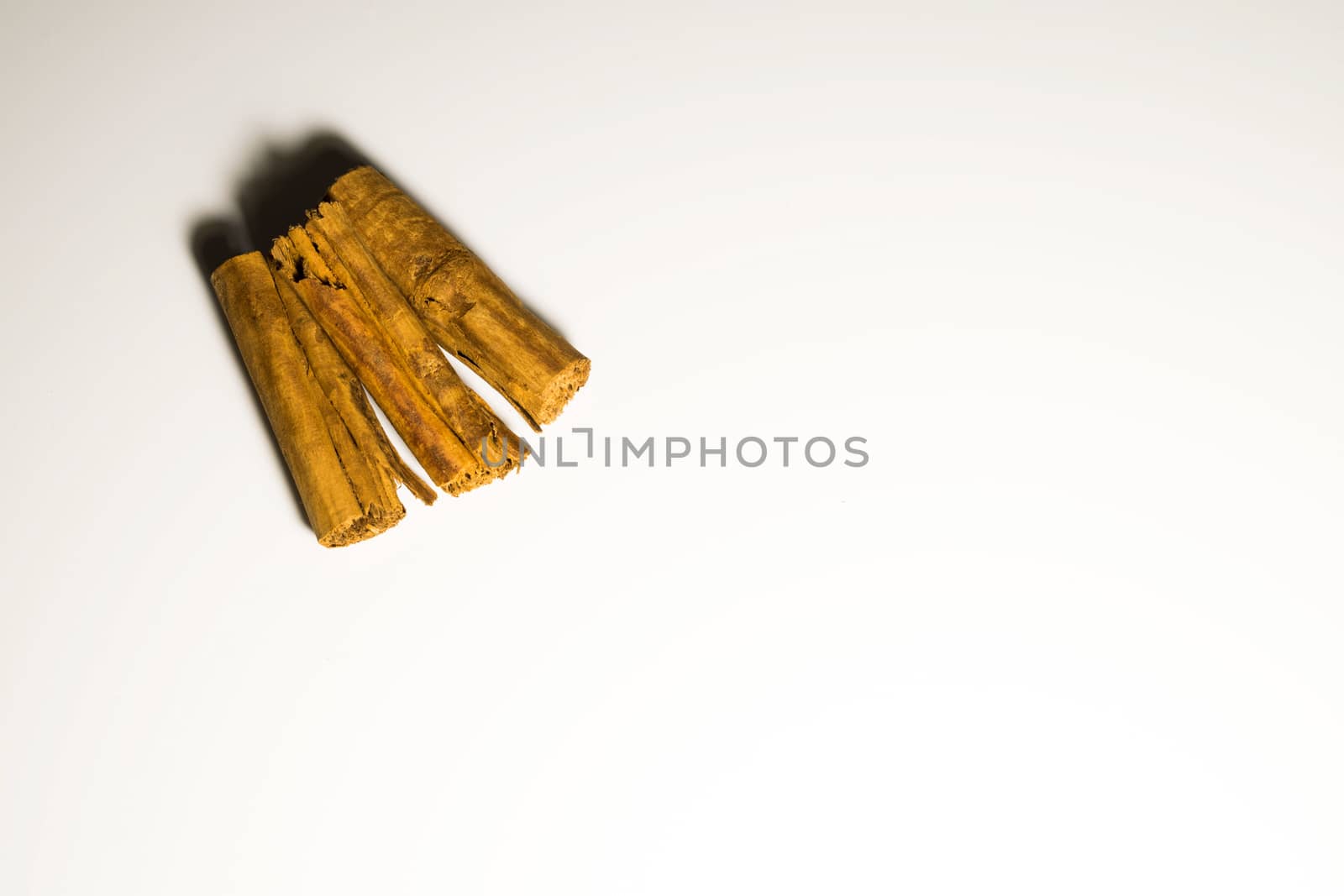 Cinnamon in a white background