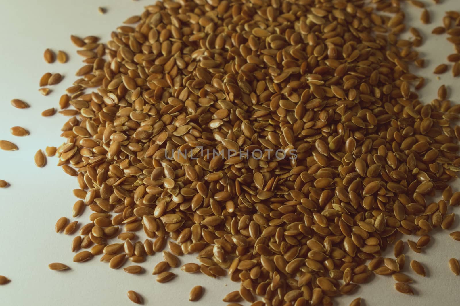 Flax seeds in a white background