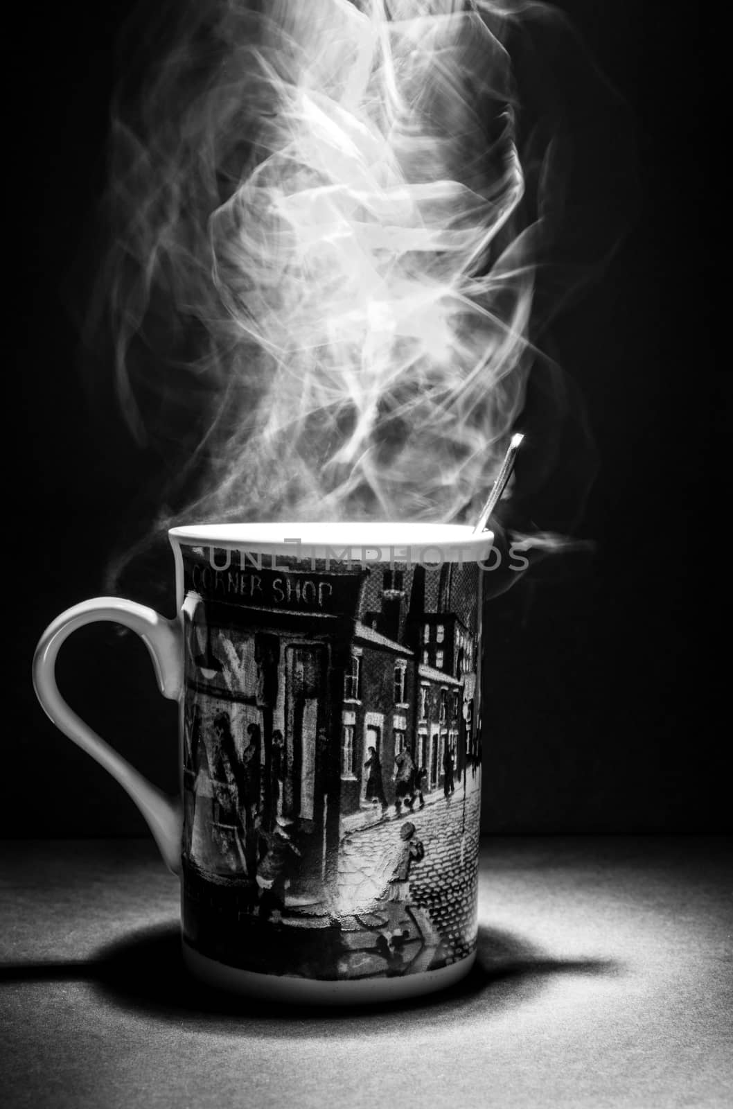 A portrait of a mug with smoke inside