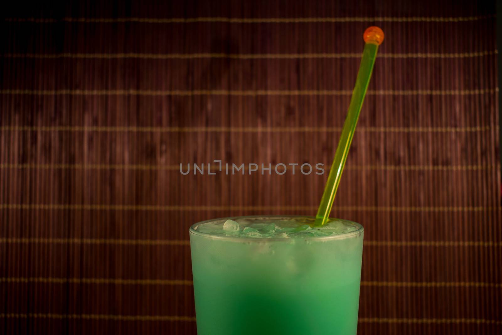 Cocktail green on a bamboo background
