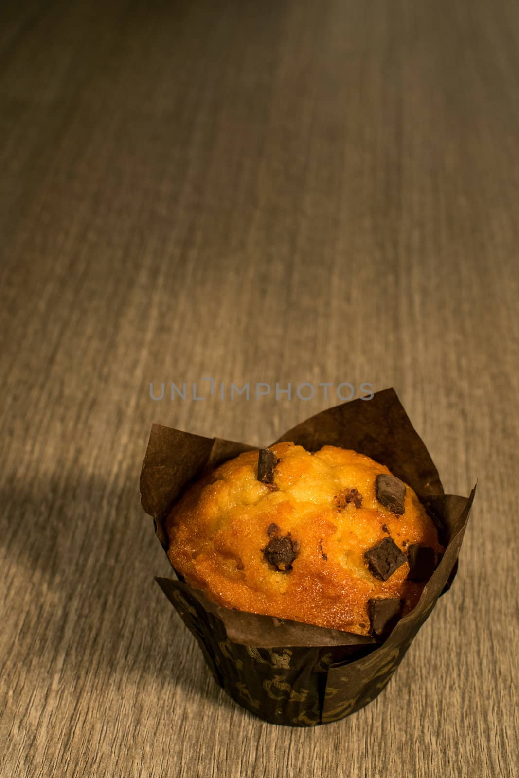 Muffin homemade, with pieces of chocolate