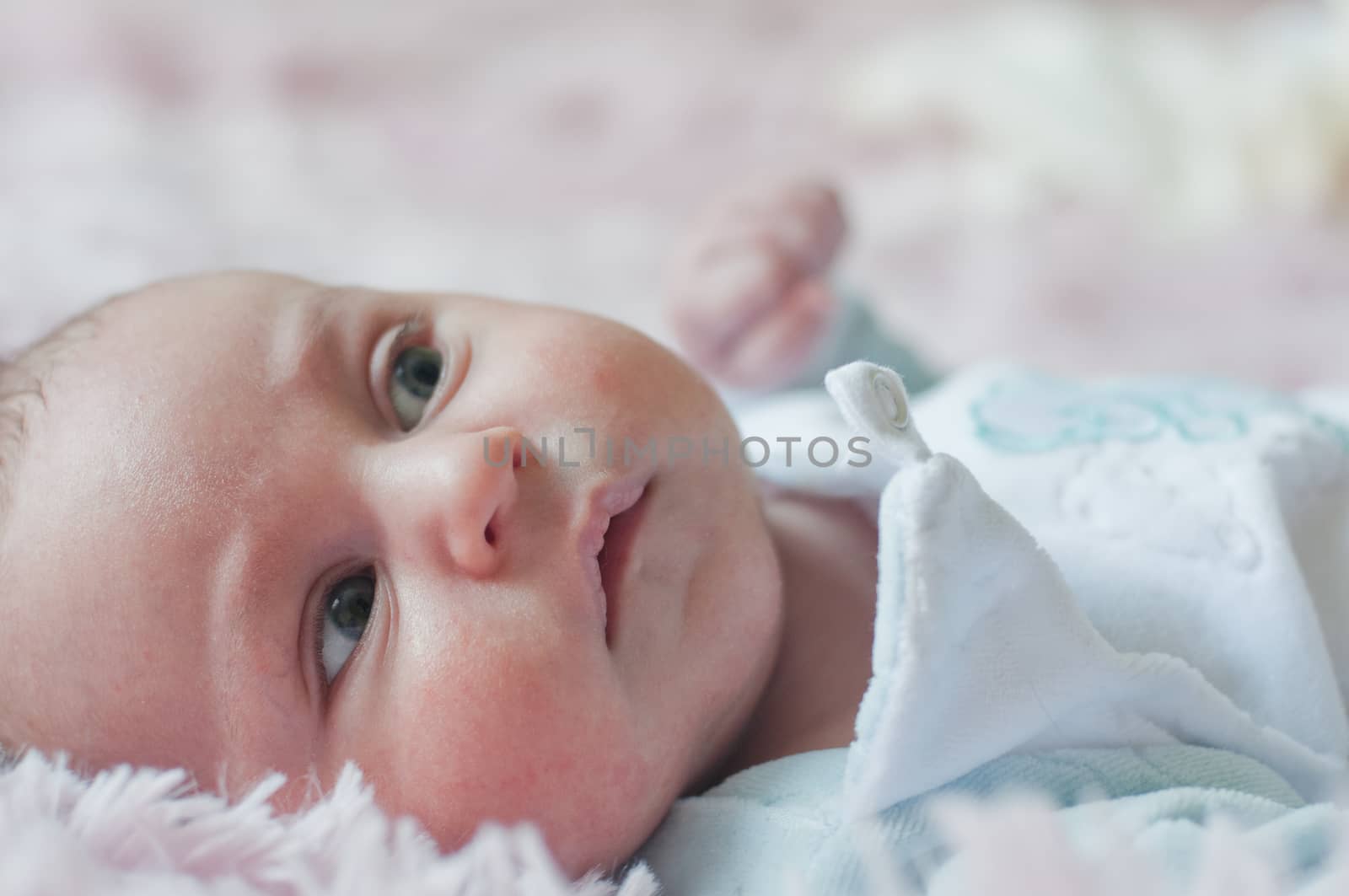 Thoughtful baby indoor in blue cloth by Linaga