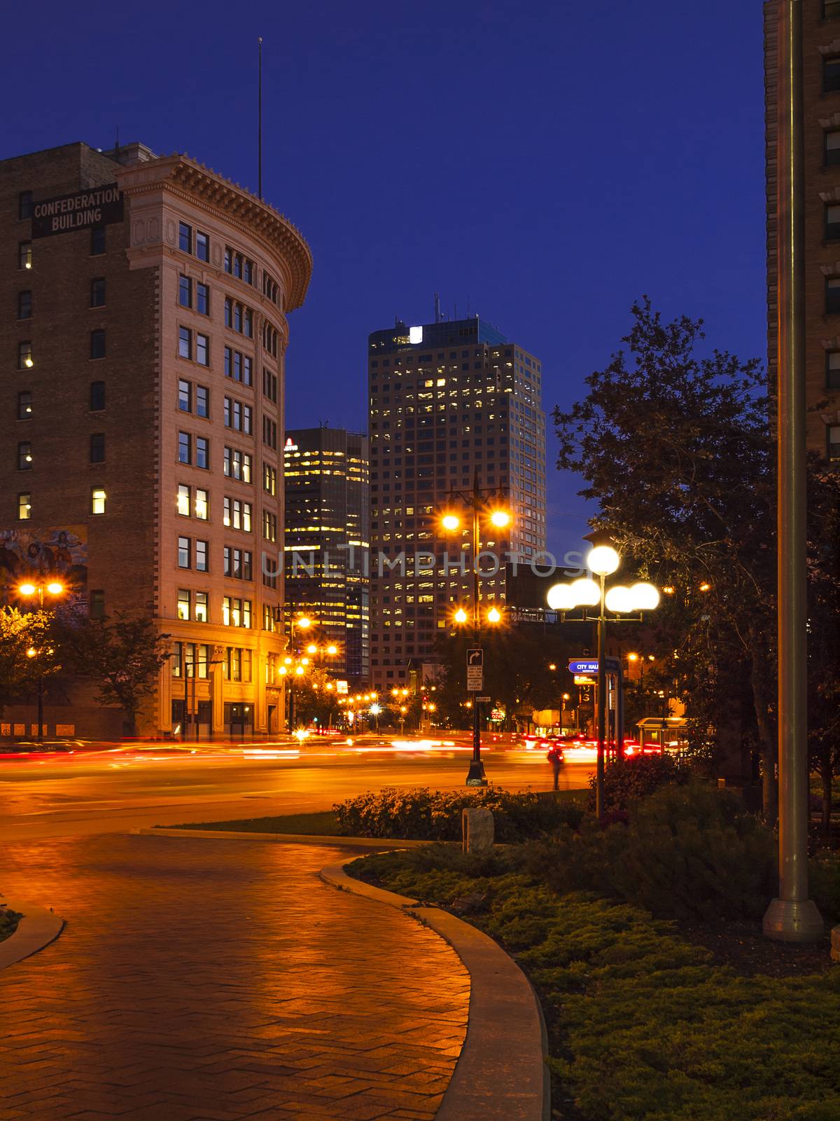 Evening Winnipeg, Main Street, downtown, Canada. Vertical frame.