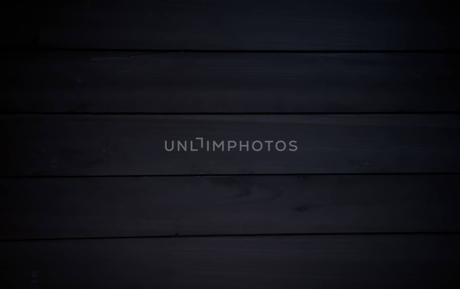 Black wood texture background by worrayuth