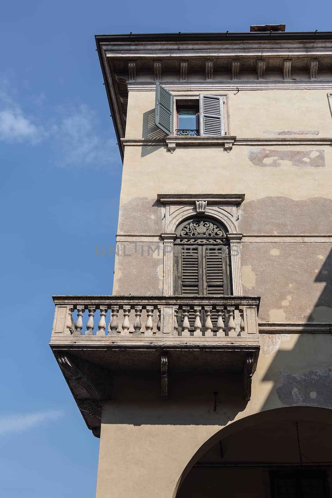 exterior of an old building windows and balcony