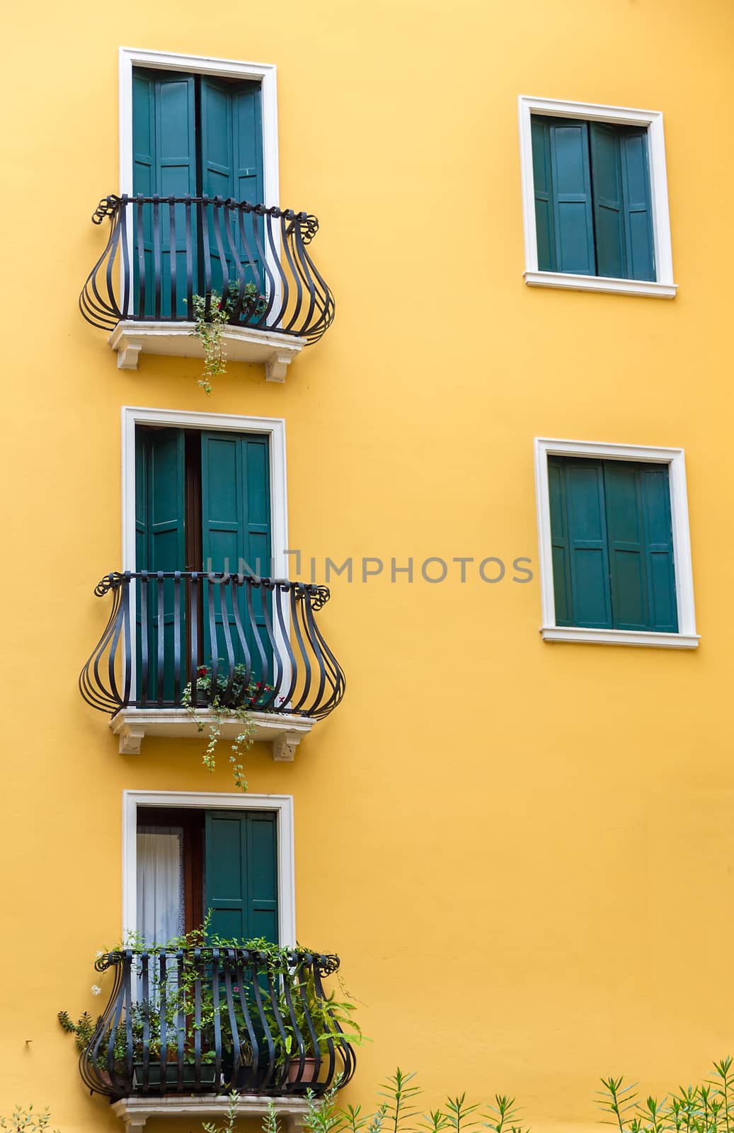 exterior of an old building windows and balcony