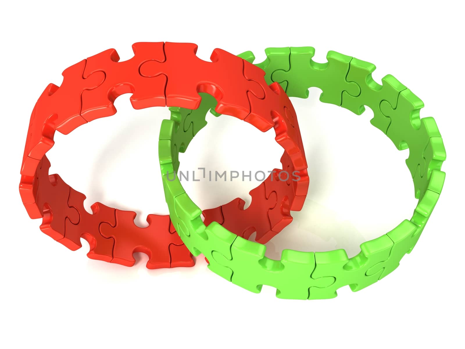 Two red and green puzzle rings, isolated on white background. Top view