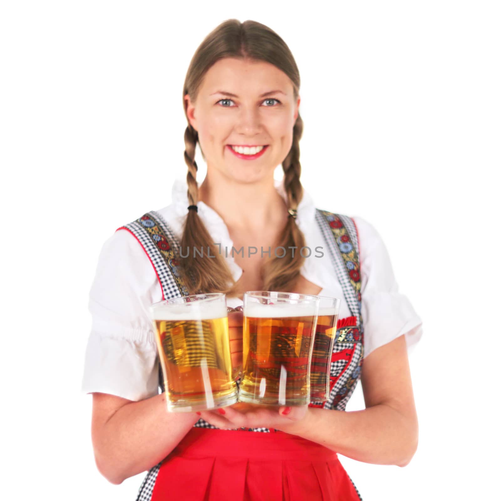 Beautiful Oktoberfest woman holding beer mugs isolated on white background
