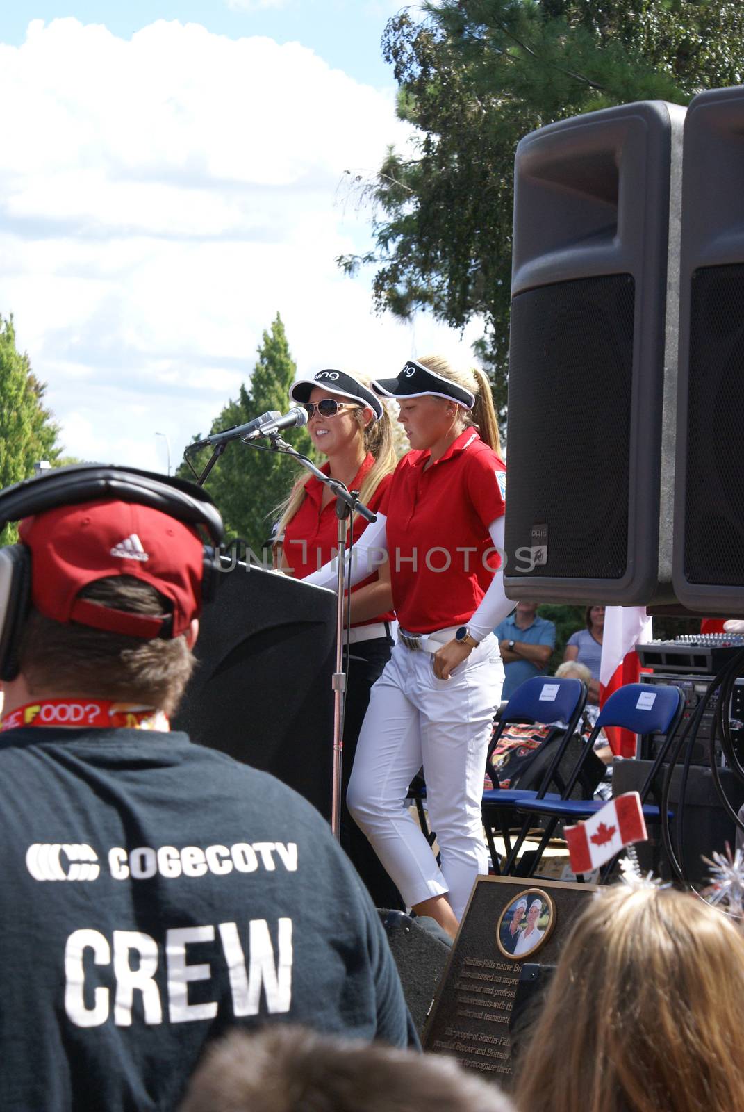 SMITHS FALLS, ON, CANADA, SEPTEMBER 09, 2016 - A 50 Editorial Image Series of local Pro Golf Sensations Brooke M. Henderson and her sister Brittany Henderson giving a speech in front of their Hometown of Smiths Falls shortly after the efforts in the Summer Rio Olympics.
