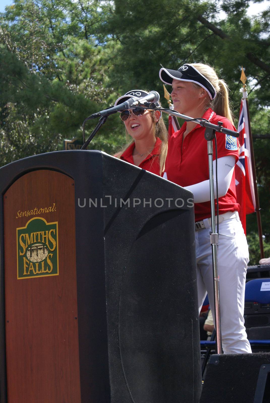 SMITHS FALLS, ON, CANADA, SEPTEMBER 09, 2016 - A 50 Editorial Image Series of Pro Golf Sensations Brooke M. Henderson and her sister Brittany Henderson giving a speech in front of their Hometown of Smiths Falls shortly after the efforts in the Summer Rio Olympics.