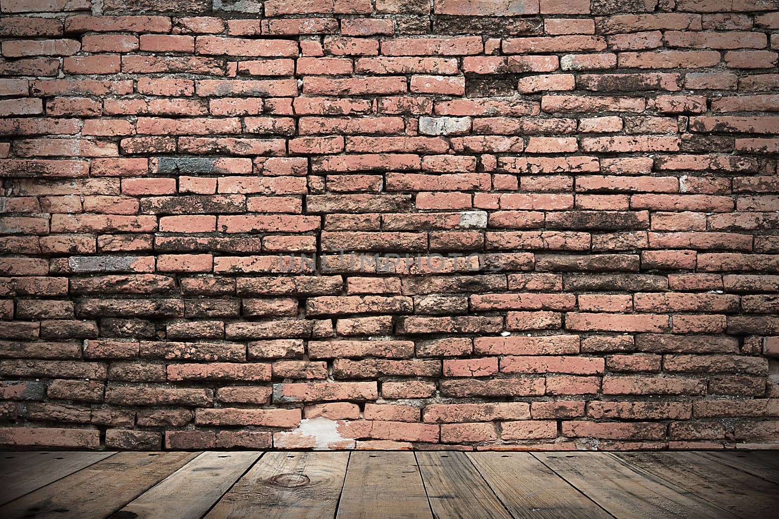 old brick wall on brown wooden floor for background design