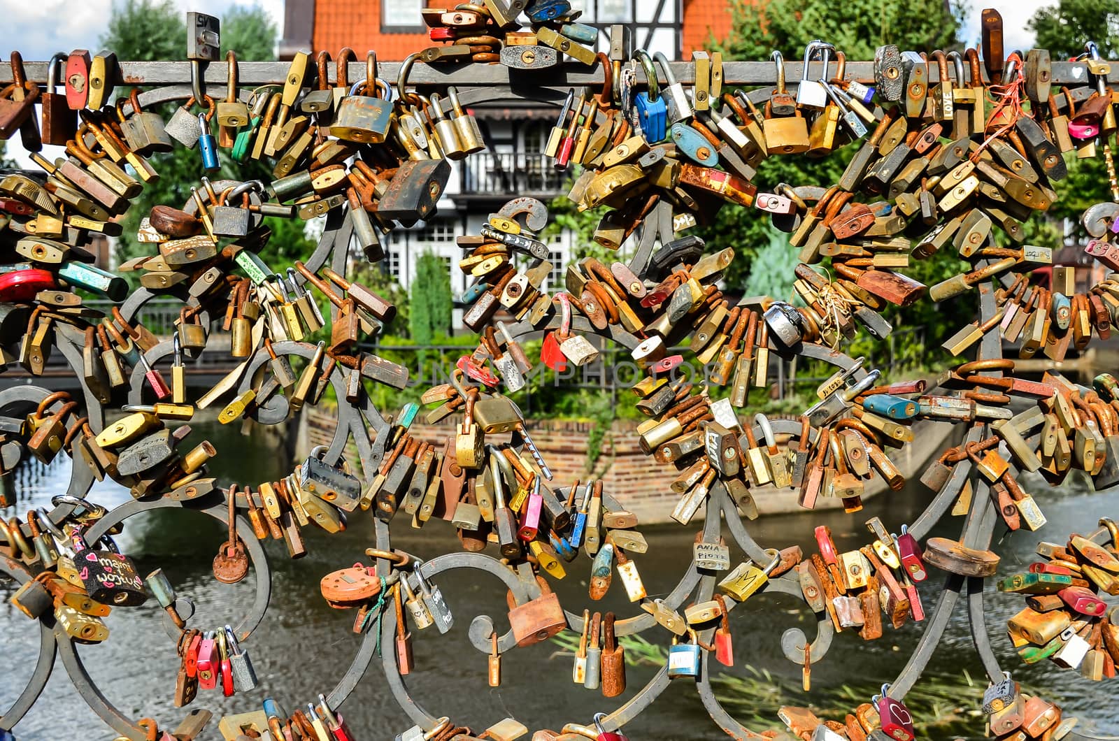 Padlocks of memories of love  hanging on the bridge next to the other locks in Gdansk-Poland