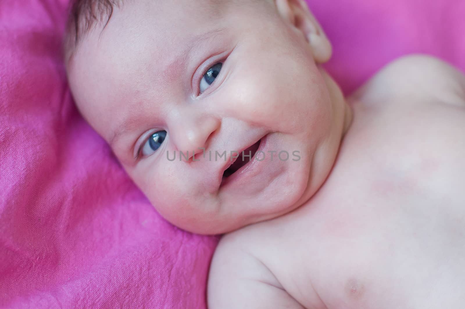 Little smiling baby closeup portrait by Linaga