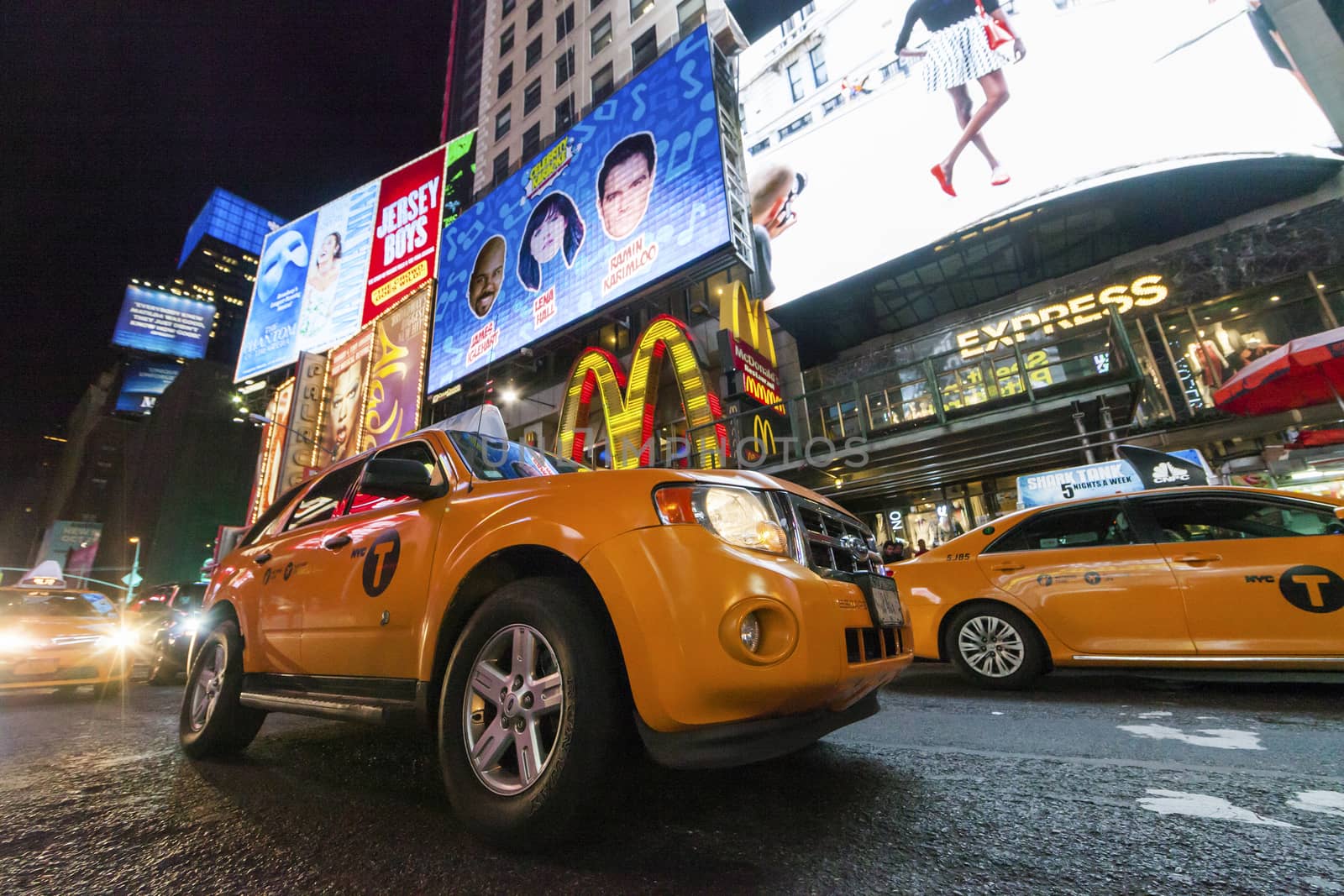 NEW YORK CITY, USA-OCTOBER 4:Times Square, featured with Broadway Theaters, Sightseeing Buses, Taxi Cabs and animated LED signs, is a symbol of New York City and the United States. Taken in Manhattan, New York City on October 4, 2014