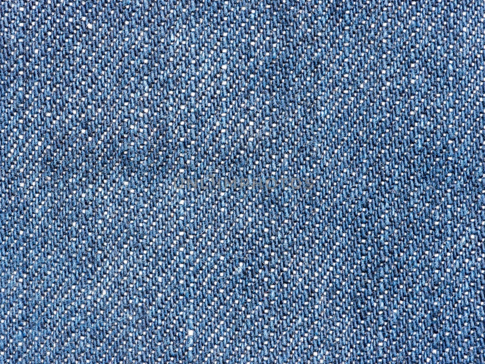 Texture of denim jeans close up by fascinadora