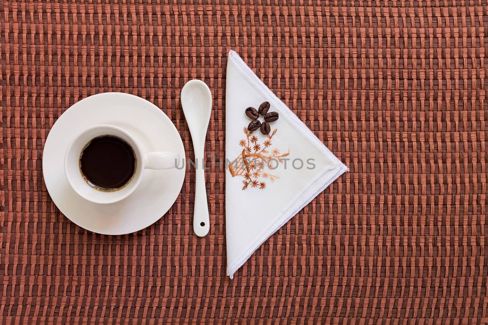 Coffee on tablecloth with coffee beans by LuigiMorbidelli