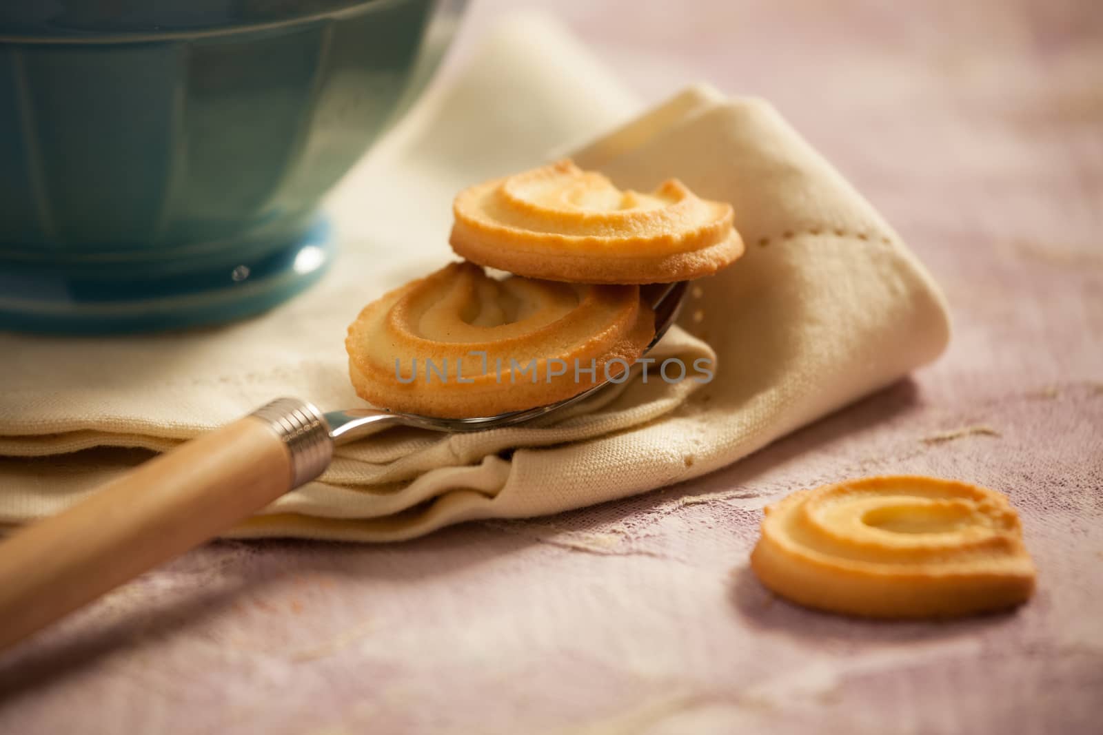 Cookies on a spoon over a napkin